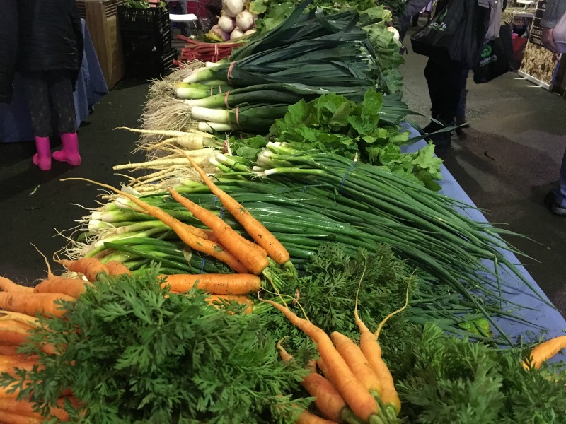 Fresh carrots and leeks at the Capital Region Farmers Market